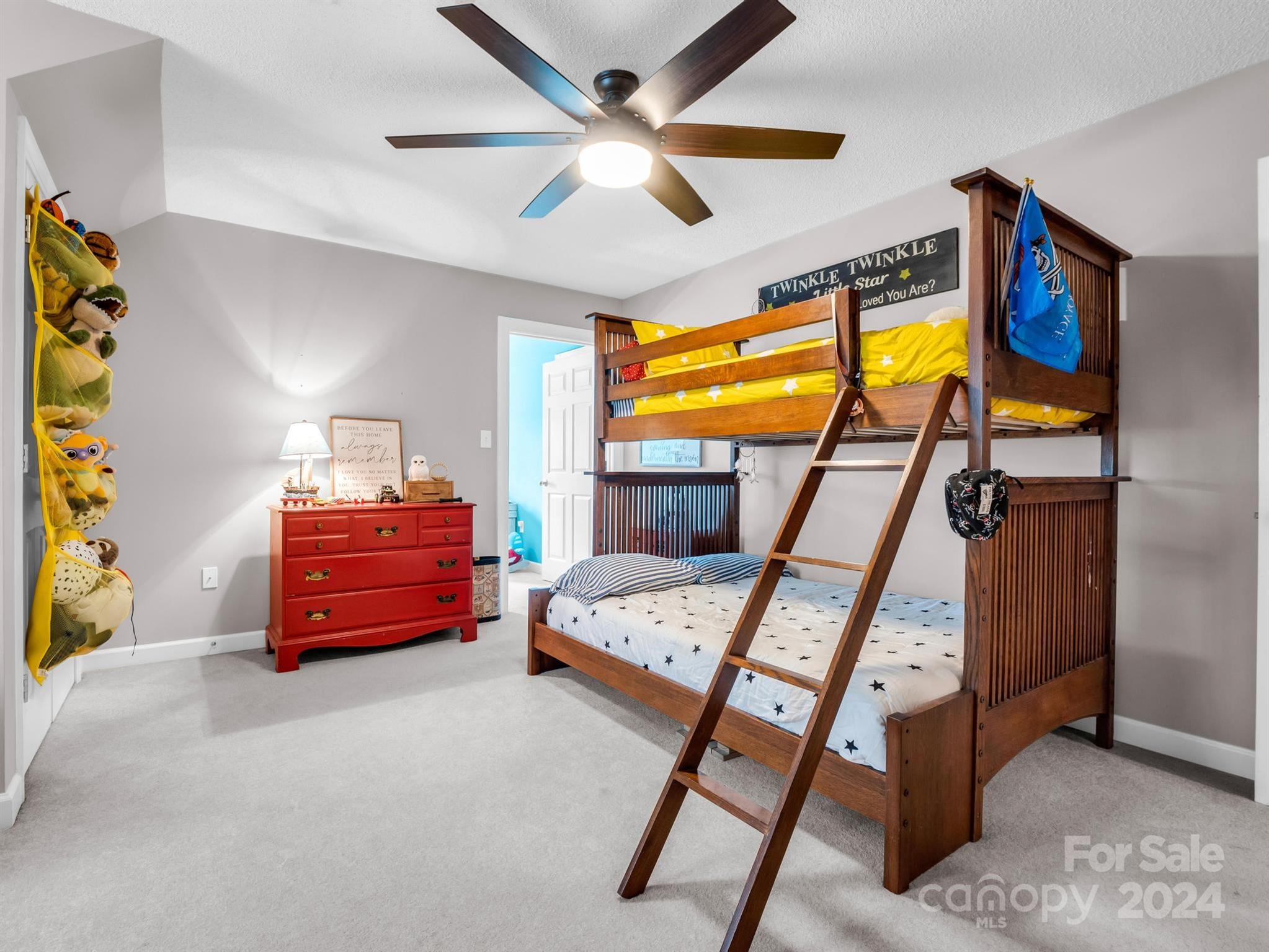 107 Fairforest Drive Rutherfordton, NC 28139 - Photo 26 of 33 a bedroom with a bed and wooden floor