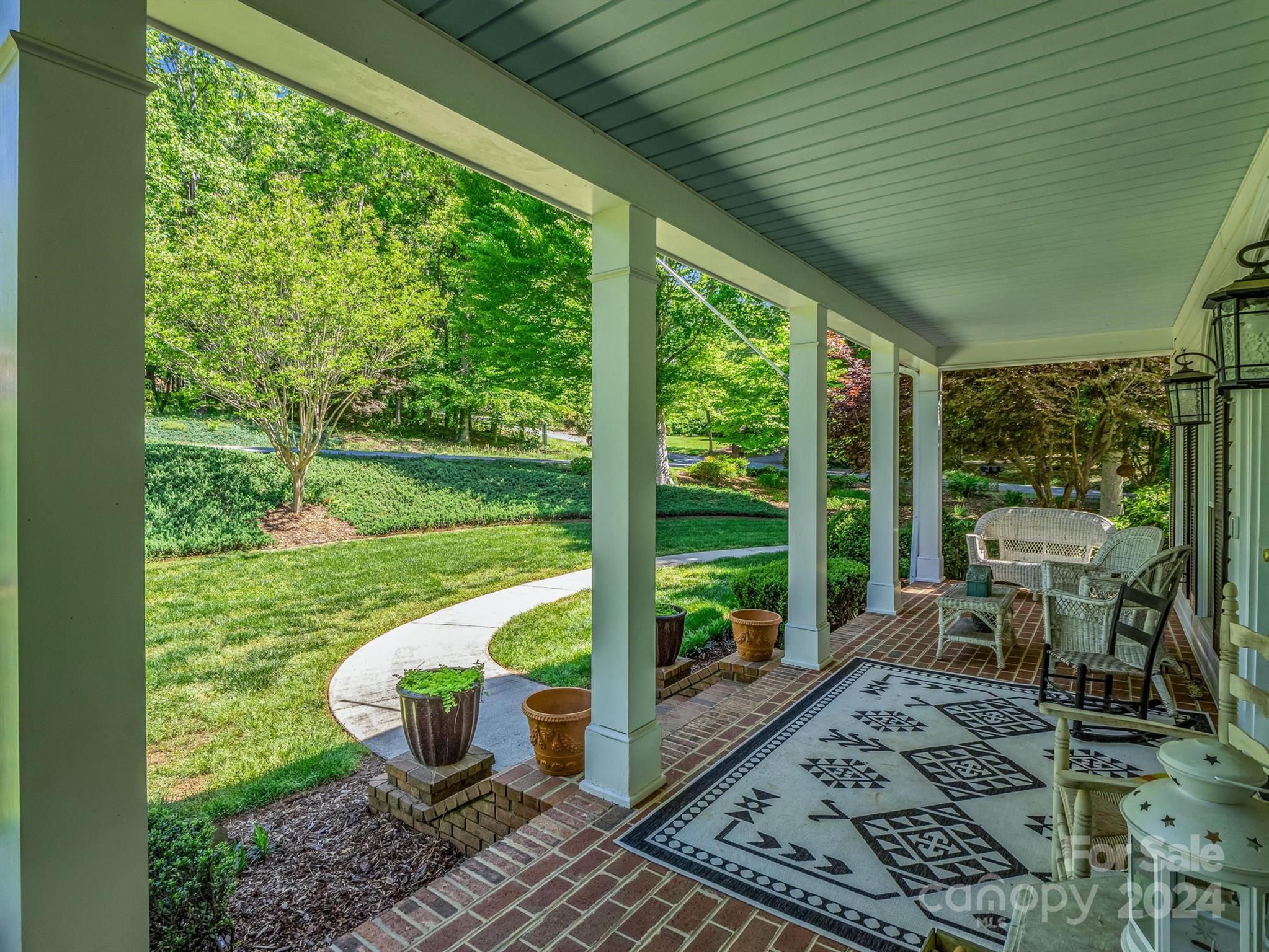 107 Fairforest Drive Rutherfordton, NC 28139 - Photo 3 of 33 a view of a porch with furniture and garden
