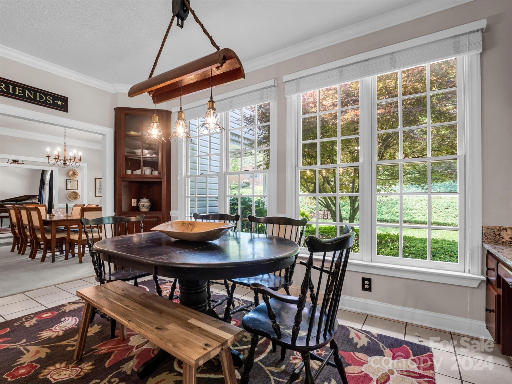 107 Fairforest Drive Rutherfordton, NC 28139 - Photo 10 of 33 a view of a dining room with furniture and chandelier