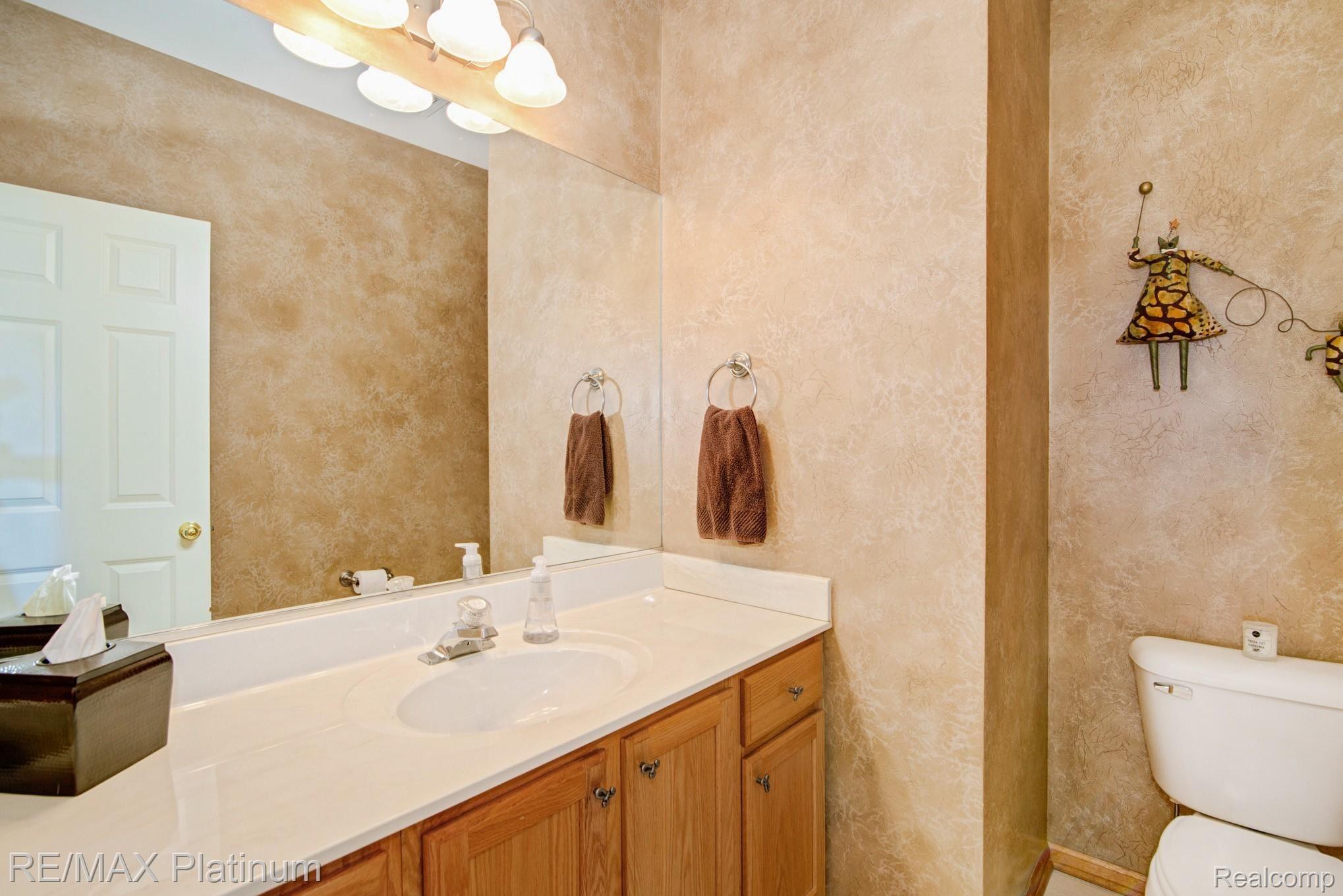 2021 Ricks Court Brighton, MI 48114 - Photo 16 of 36 Main floor powder room