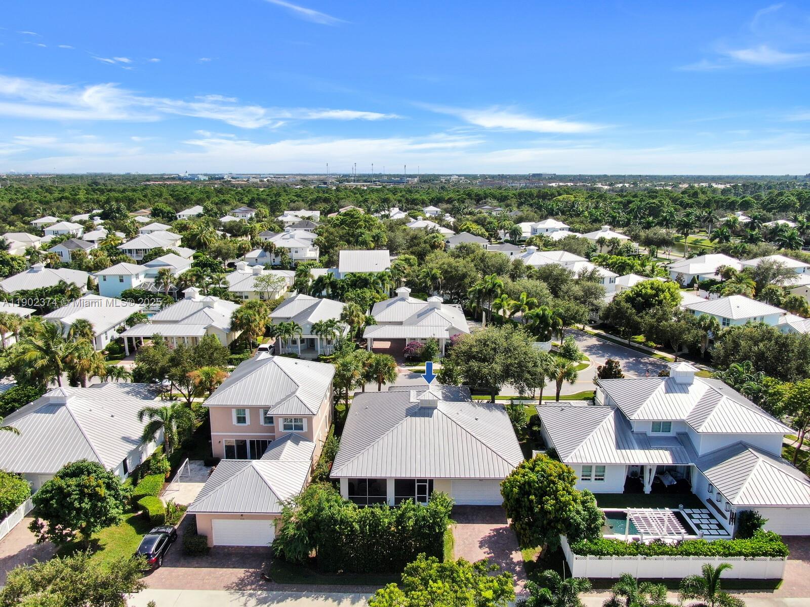 1053 Big Pine Way Jupiter, FL 33458 - Photo 38 of 48 an aerial view of residential houses with outdoor space