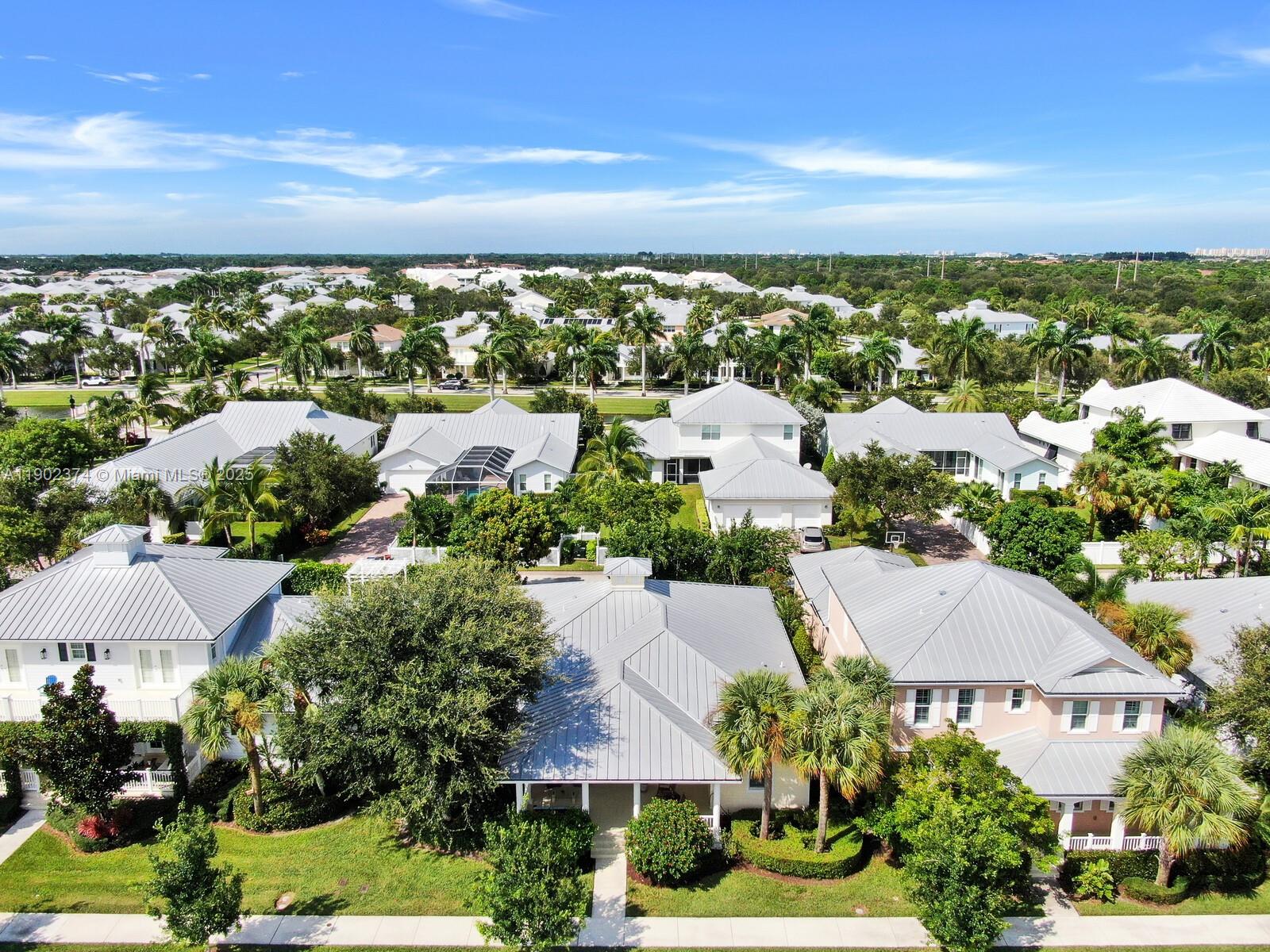 1053 Big Pine Way Jupiter, FL 33458 - Photo 41 of 48 an aerial view of residential houses with outdoor space and street view