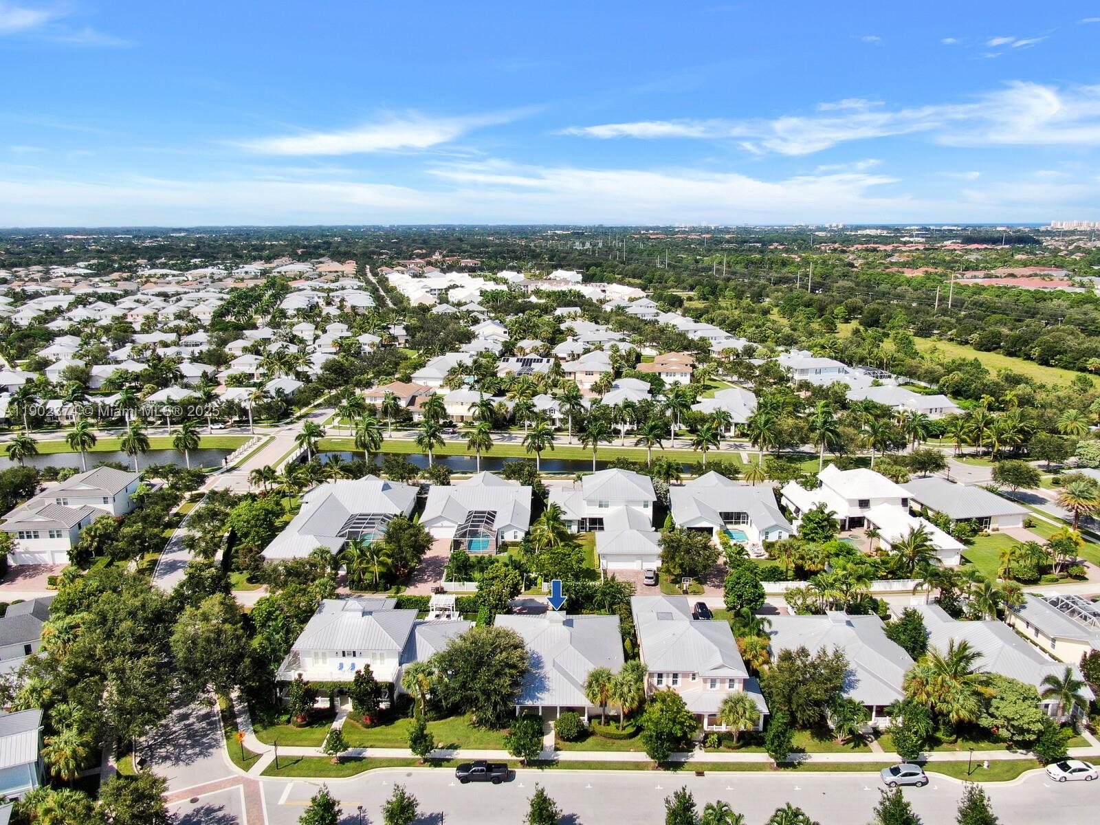 1053 Big Pine Way Jupiter, FL 33458 - Photo 42 of 48 an aerial view of residential building with green space