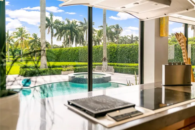 a view of swimming pool from a balcony