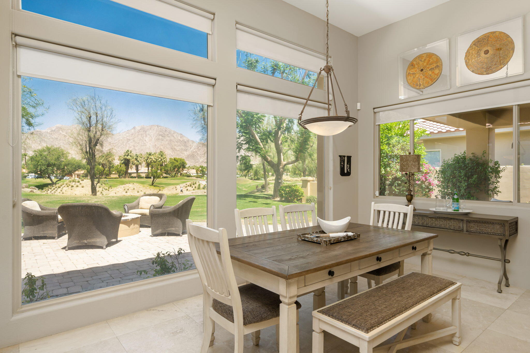 57355 Interlachen La Quinta, CA 92253 - Photo 12 of 35 a view of a dining room with furniture window and outside view