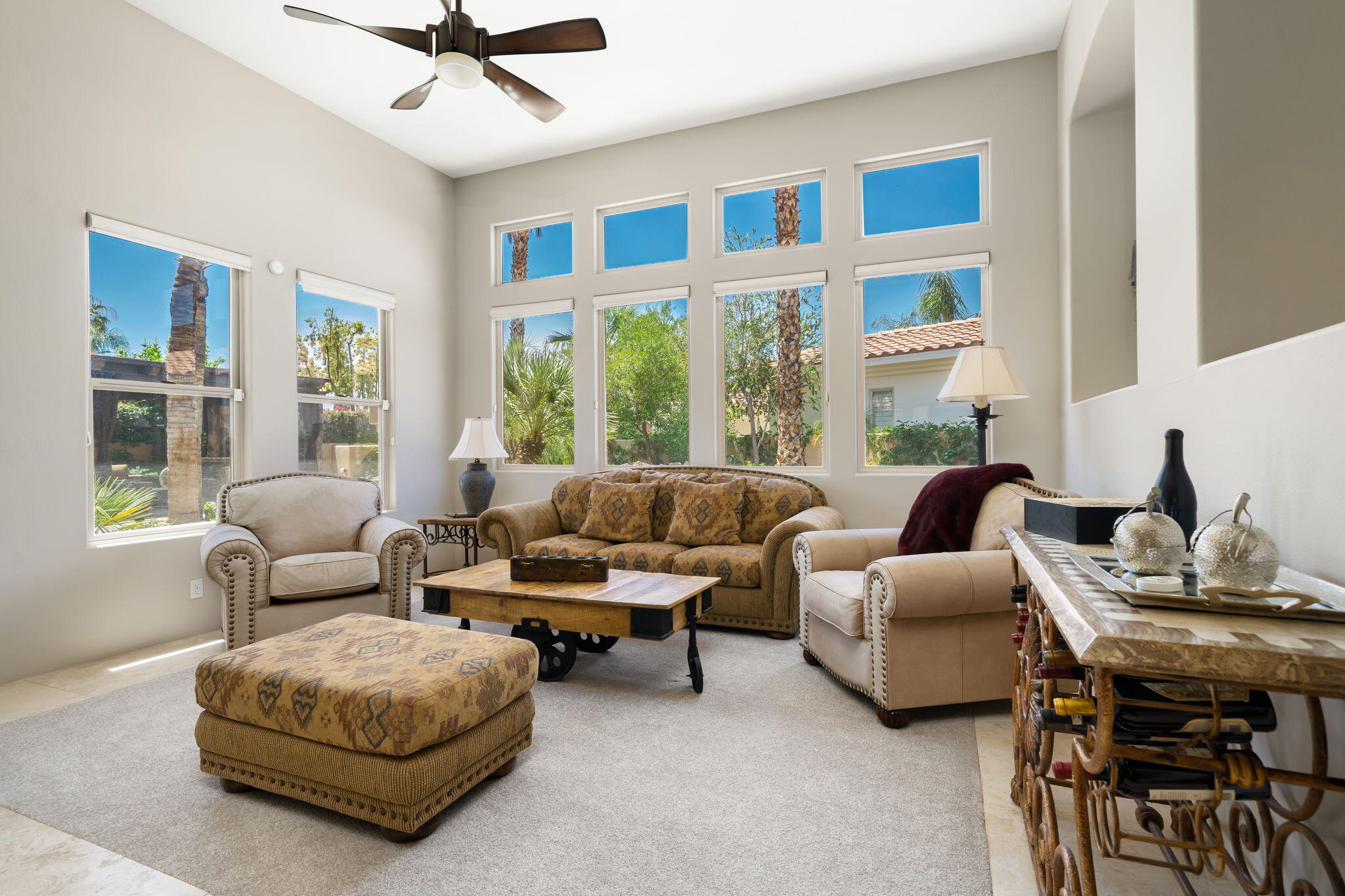 57355 Interlachen La Quinta, CA 92253 - Photo 5 of 35 a living room with furniture and a large window