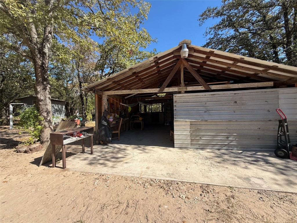 680 Hidden Oaks Drive Elgin, TX 78621 - Photo 4 of 6 a view of a house with a yard