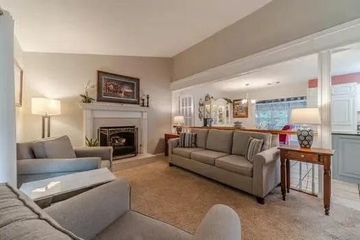 a kitchen with counter top space a sink cabinets and appliances