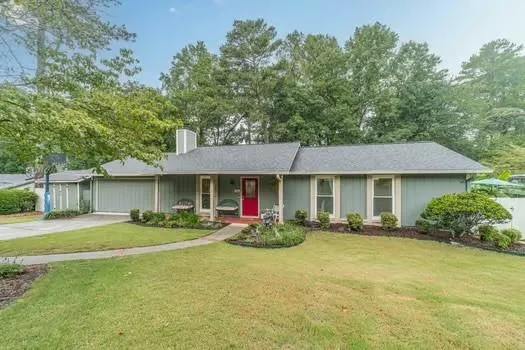 a front view of a house with an outdoor space