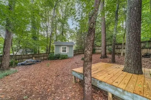 a view of a chairs and table on the wooden floor