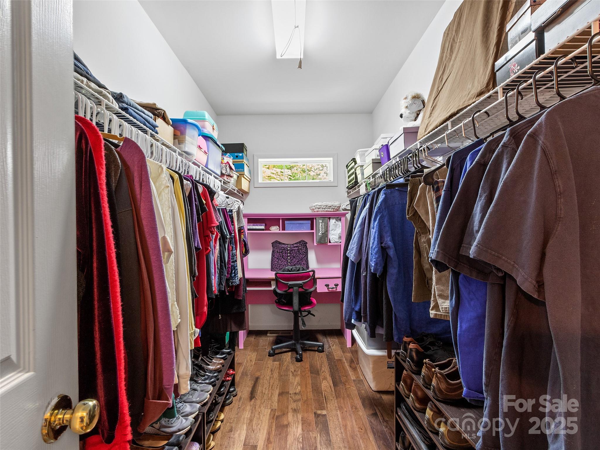 161 Blue Rock Road Burnsville, NC 28714 - Photo 26 of 48 a view of walk in closet with clothes