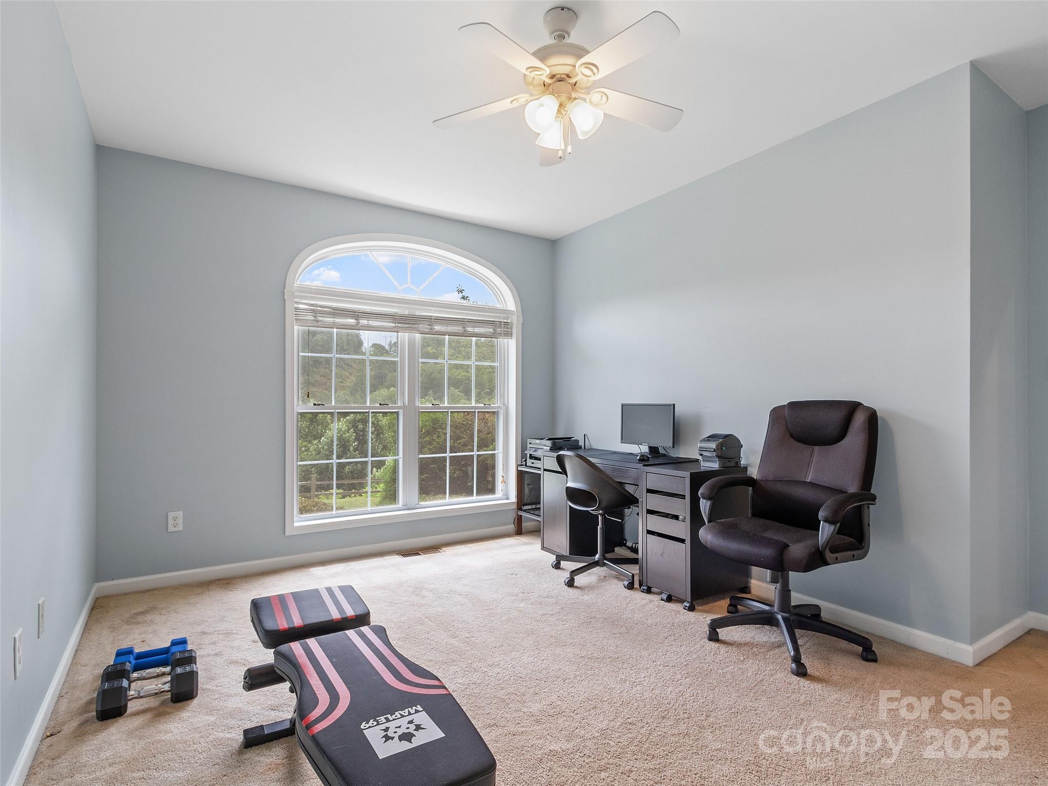 161 Blue Rock Road Burnsville, NC 28714 - Photo 30 of 48 a living room with furniture and a window