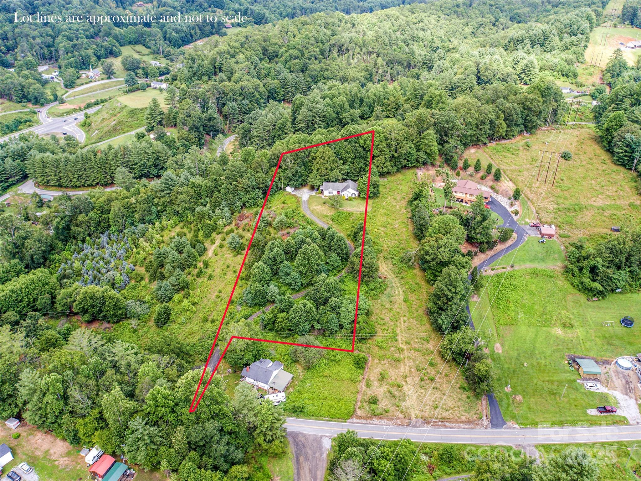 161 Blue Rock Road Burnsville, NC 28714 - Photo 41 of 48 an aerial view of residential house with outdoor space and trees all around