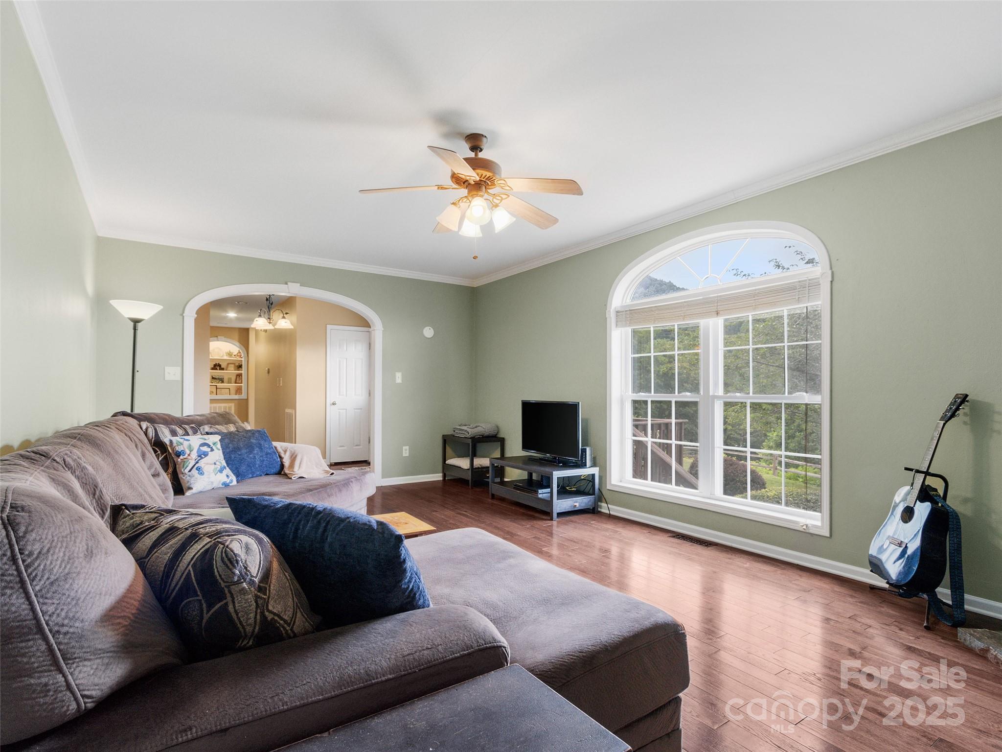 161 Blue Rock Road Burnsville, NC 28714 - Photo 8 of 48 a living room with furniture and a large window