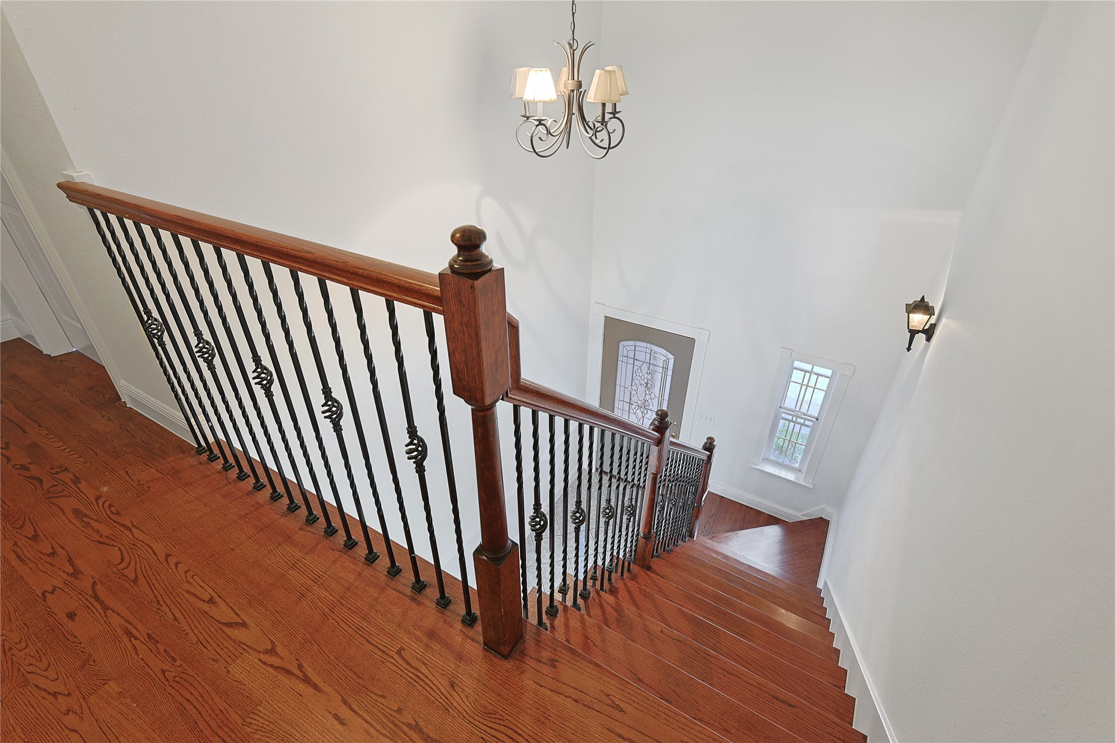 8502 Detroit Street, Unit C Houston, TX 77017 - Photo 12 of 15 a view of a hallway with wooden floor and staircase