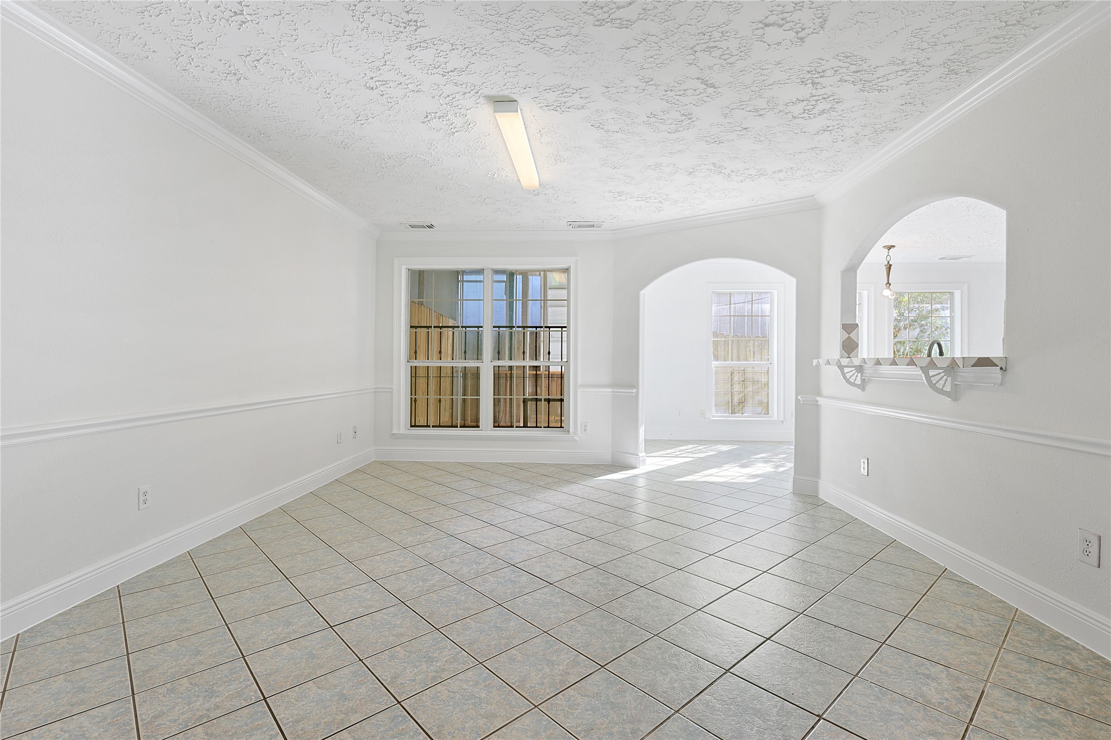 8502 Detroit Street, Unit C Houston, TX 77017 - Photo 4 of 15 a view of empty room with wooden floor