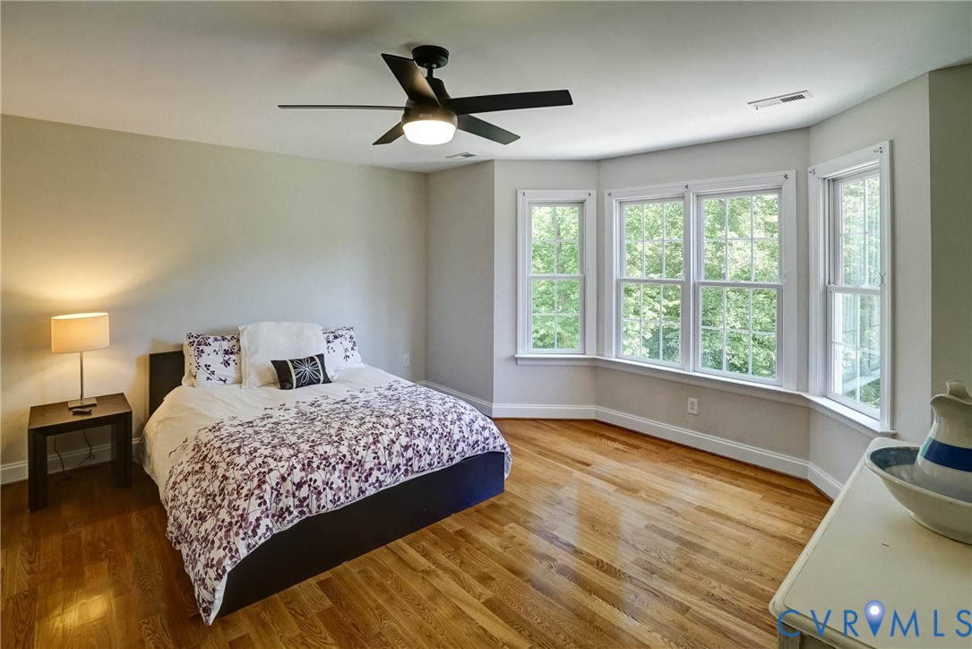 1295 Hermitage Road Manakin-Sabot, VA 23103 - Photo 47 of 55 a bedroom with a large bed and a large window