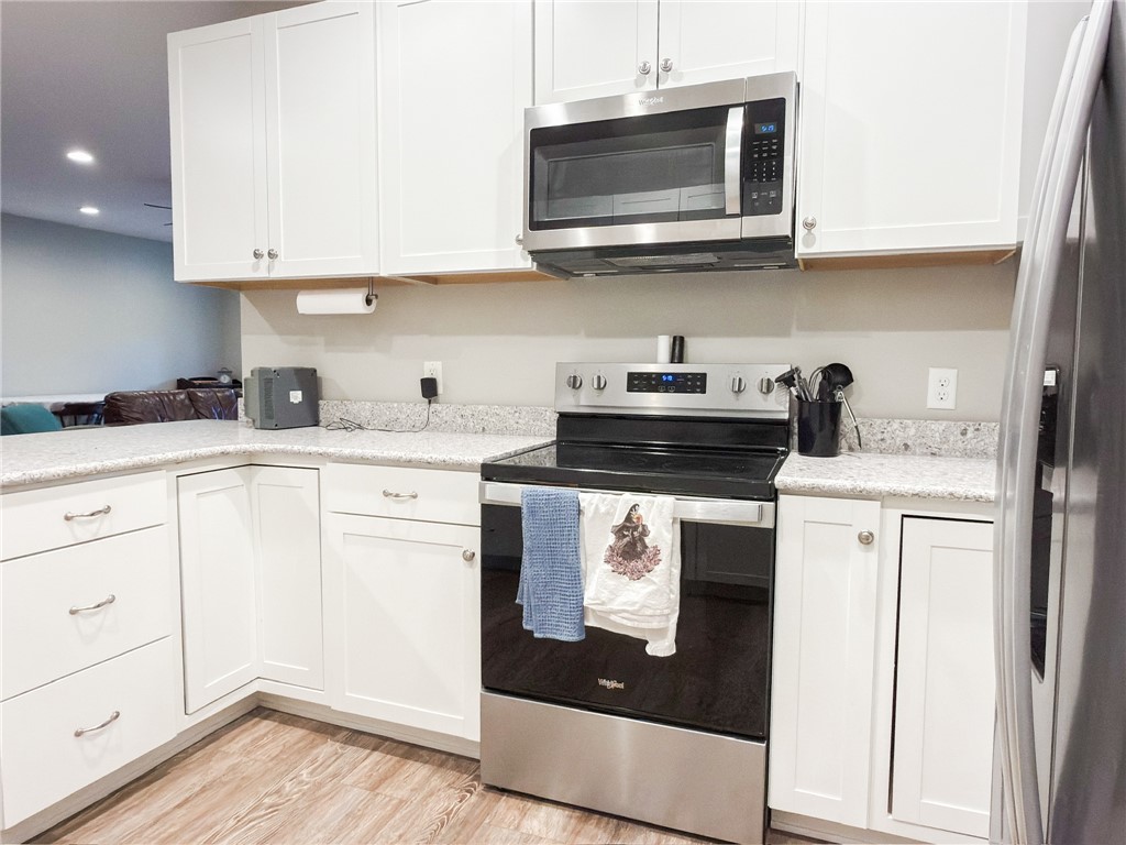 2409 Watkins Road Anderson, SC 29625 - Photo 36 of 44 This Basement kitchen features a bright aesthetic and modern appliances, perfect for everyday living.