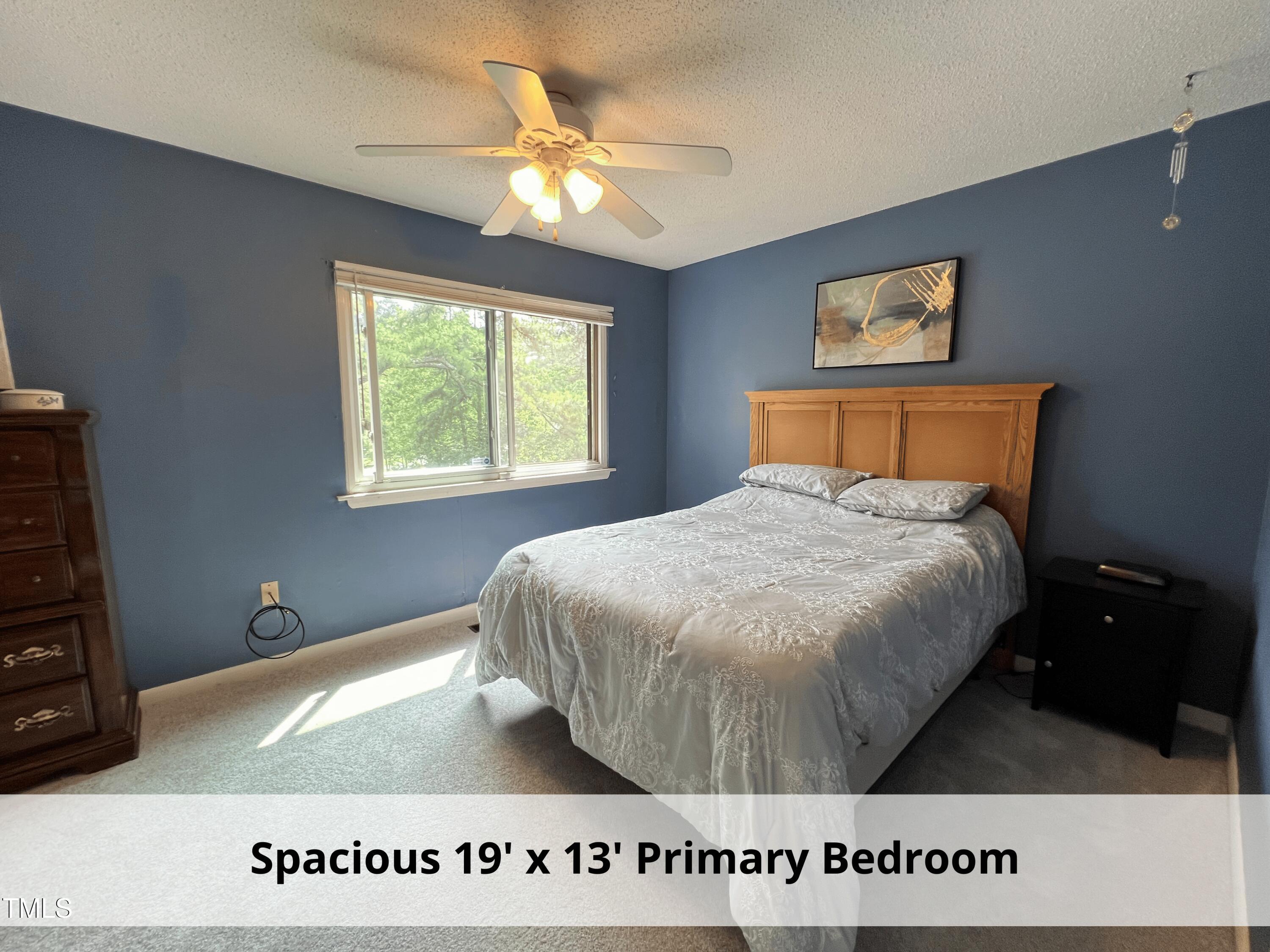 3775 Guess Road, Unit 43 Durham, NC 27705 - Photo 19 of 34 a bed sitting in a bedroom next to a window