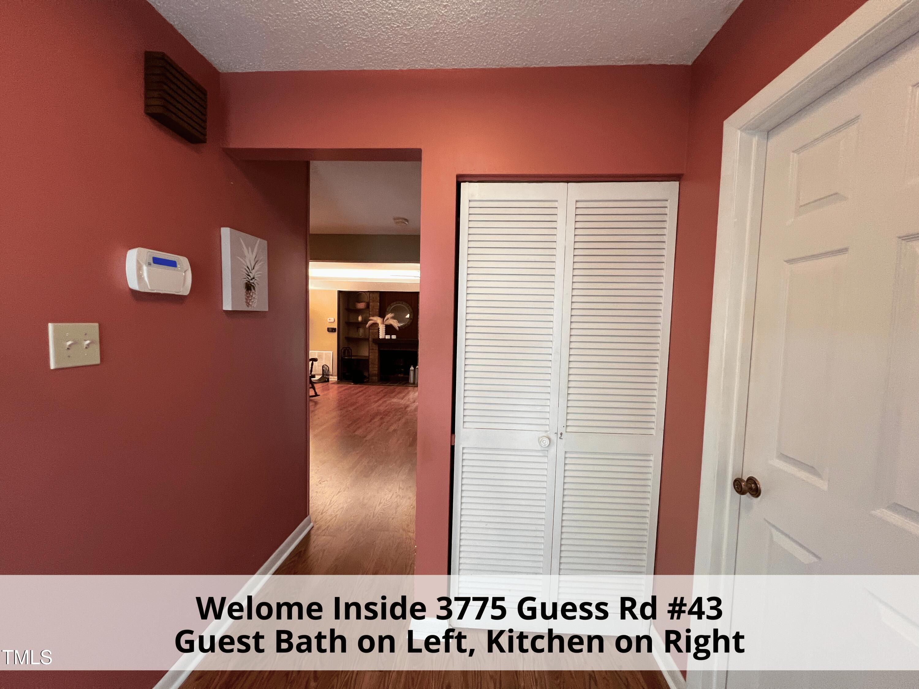 3775 Guess Road, Unit 43 Durham, NC 27705 - Photo 7 of 34 a view of a hall with an entryway