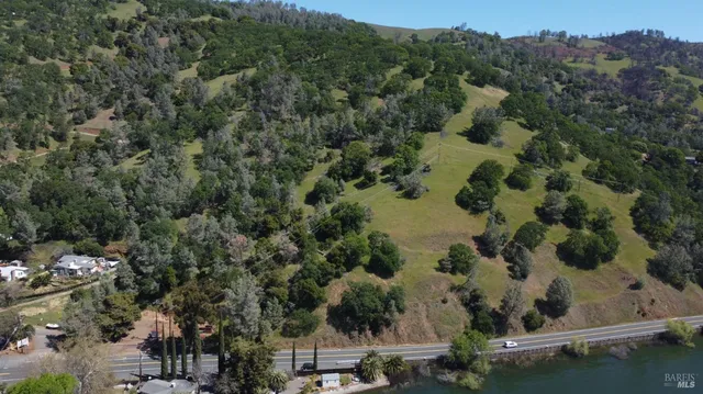 an aerial view of residential house with outdoor space