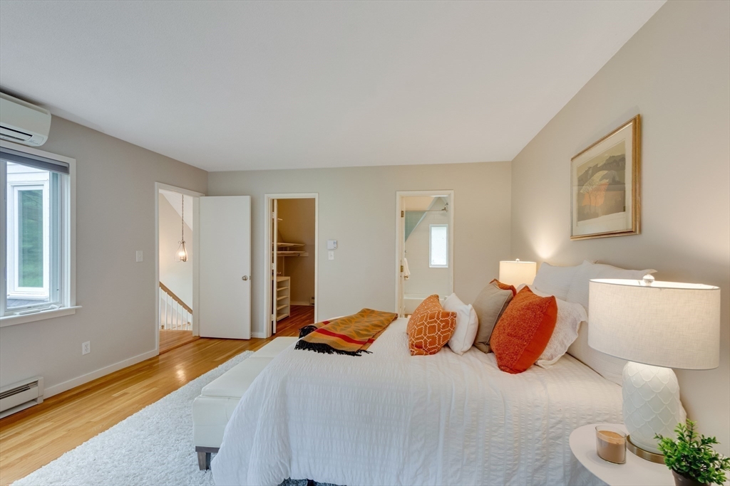 41 Todd Pond Road, Unit 41 Lincoln, MA 01773 - Photo 20 of 26 a bedroom with a bed and a couch