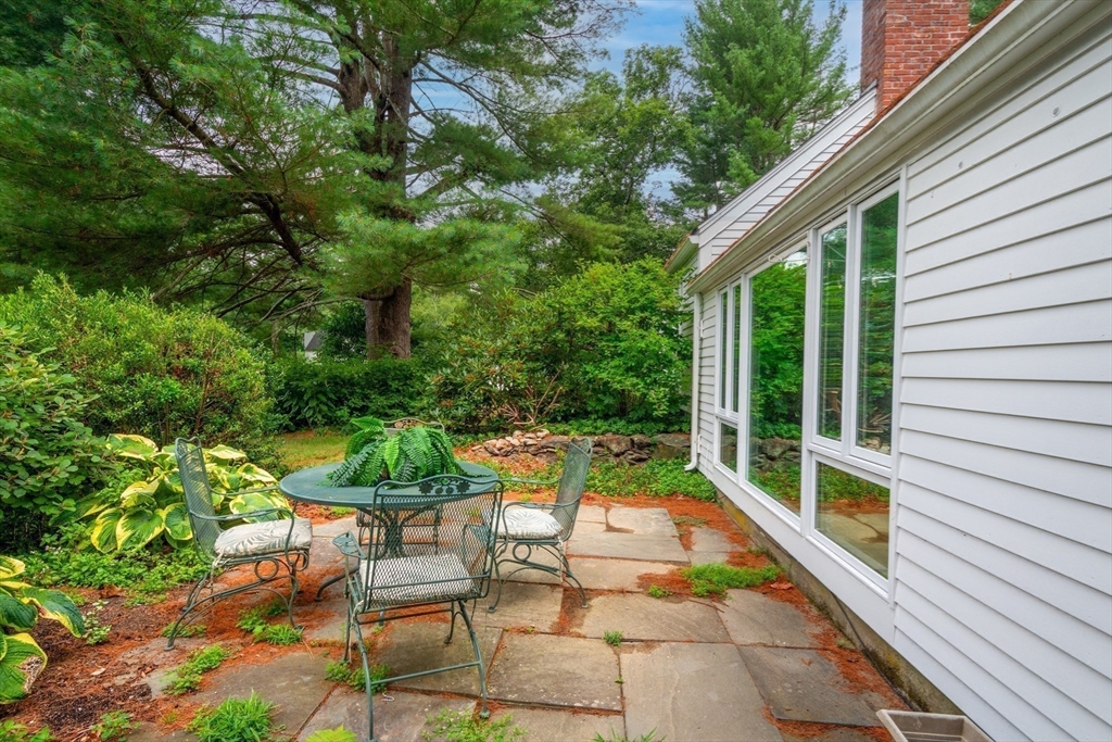 41 Todd Pond Road, Unit 41 Lincoln, MA 01773 - Photo 23 of 26 a view of backyard with swimming pool and outdoor seating