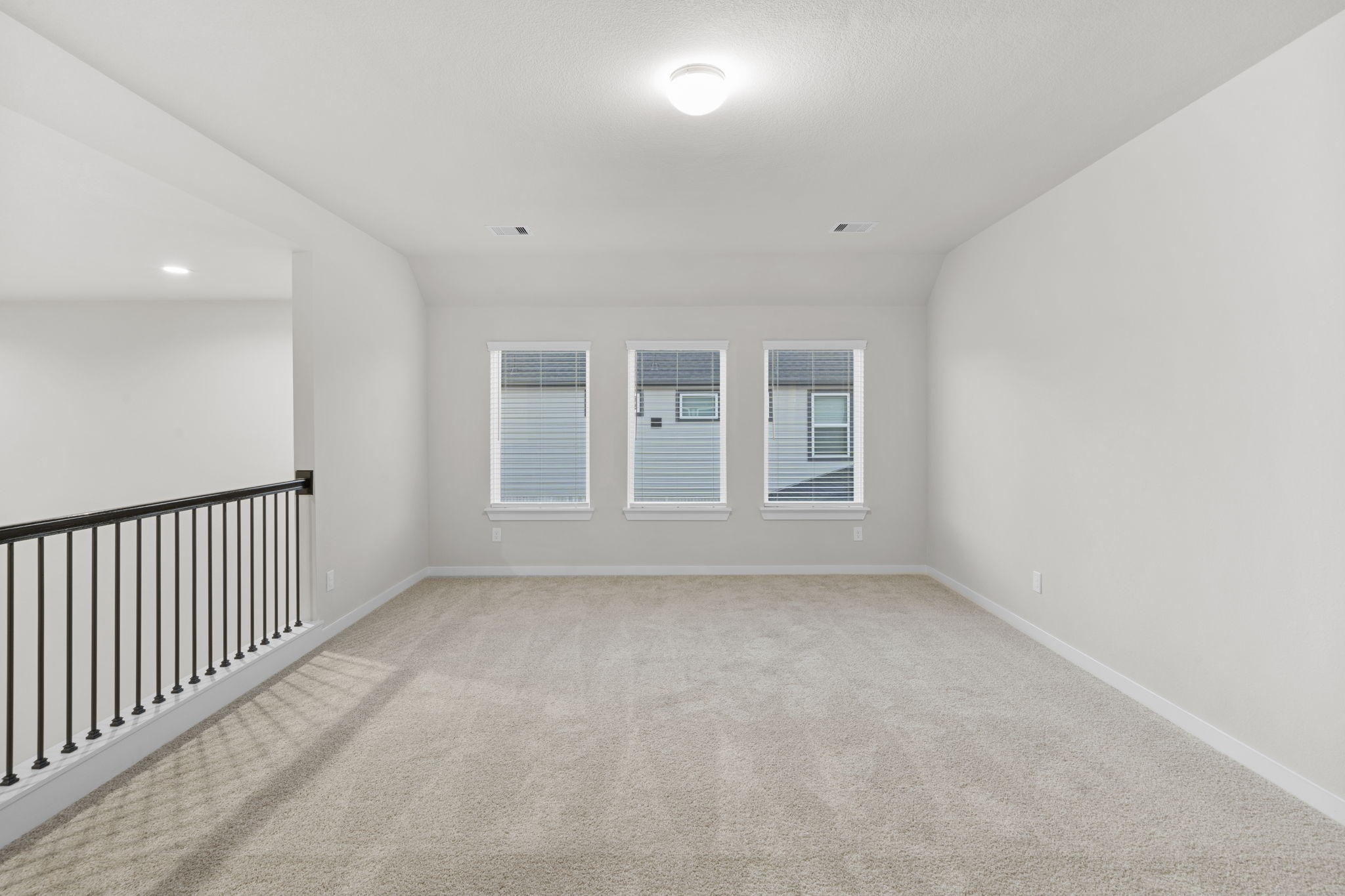 3015 Boulder Ridge Drive Rosenberg, TX 77471 - Photo 19 of 34 en empty room with windows