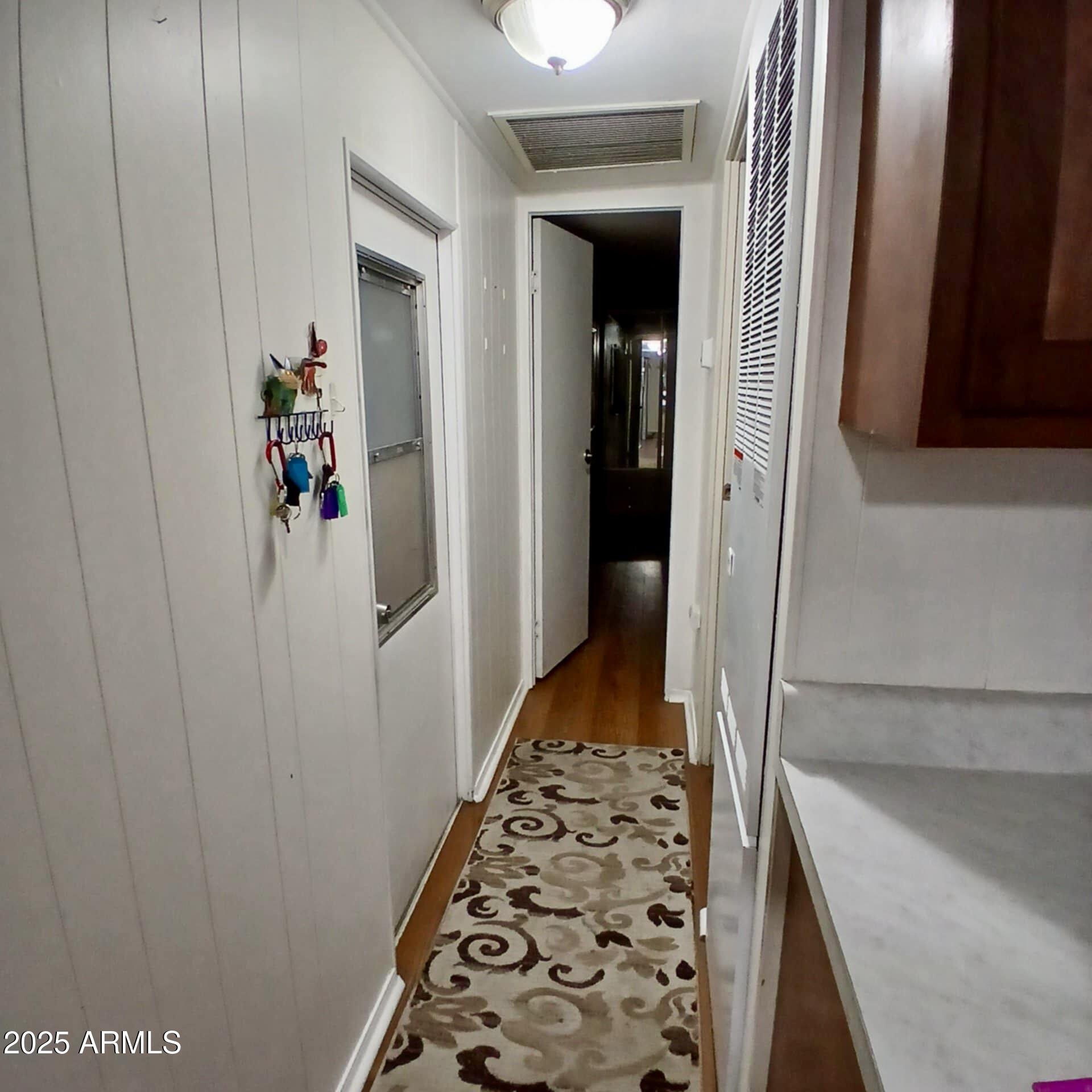 303 South Recker Road, Unit 74 Mesa, AZ 85206 - Photo 10 of 16 Hallway towards bedroom