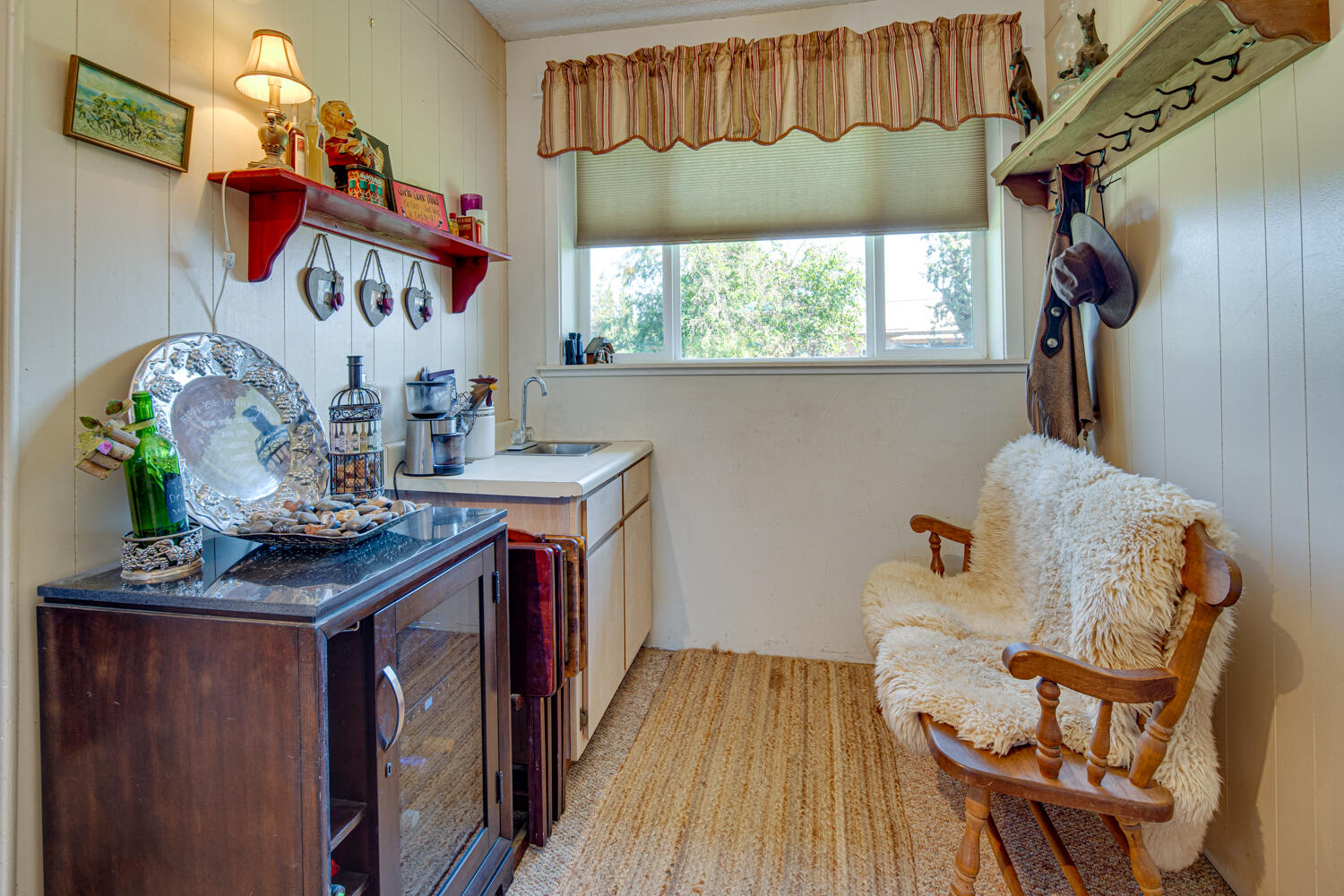 2218 Southwest 79th Street Redmond, OR 97756 - Photo 18 of 54 a living room with a couch and a table
