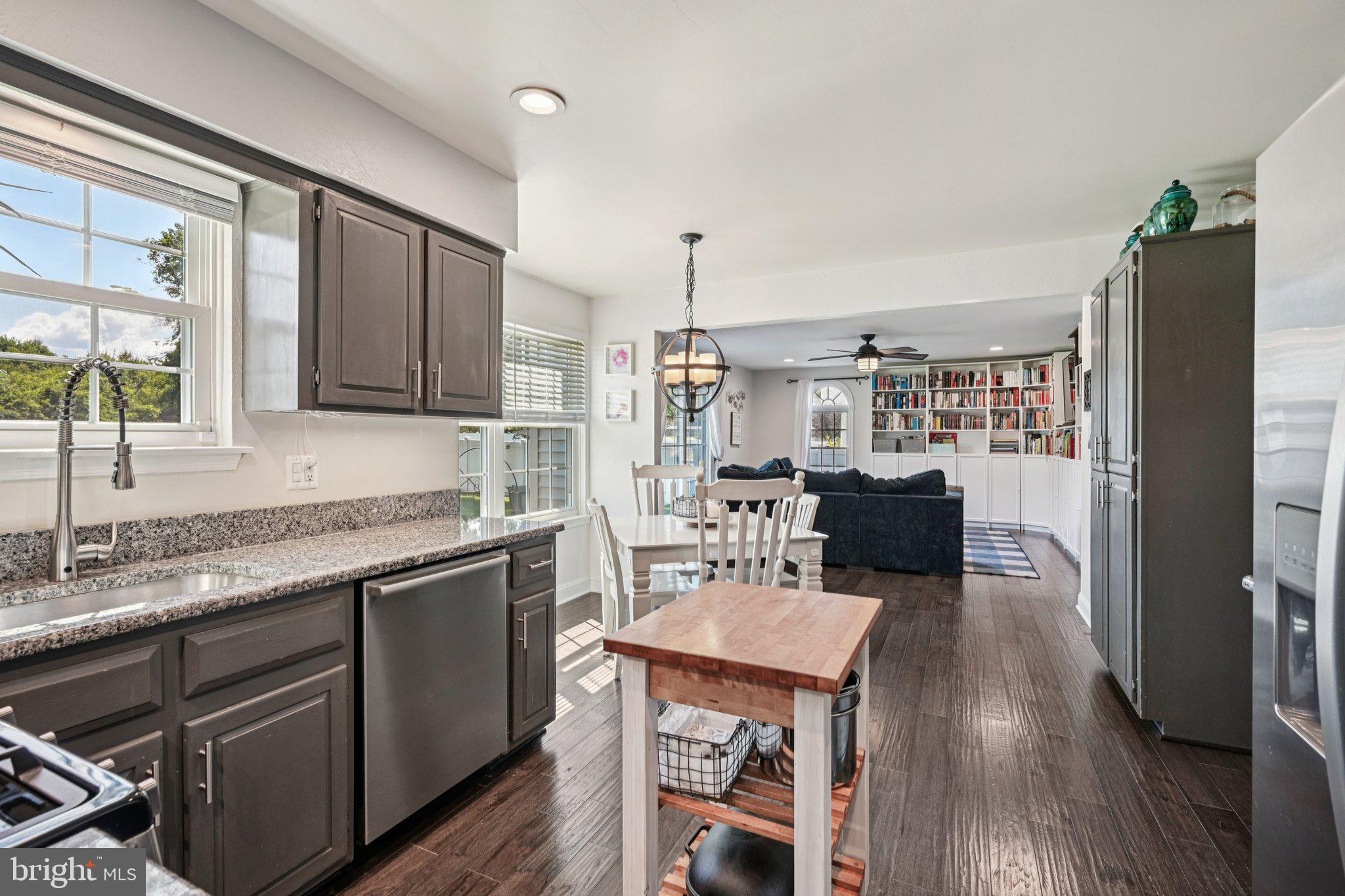 39 Willow Ridge Road Marlton, NJ 08053 - Photo 13 of 43 a kitchen with a table chairs refrigerator and cabinets