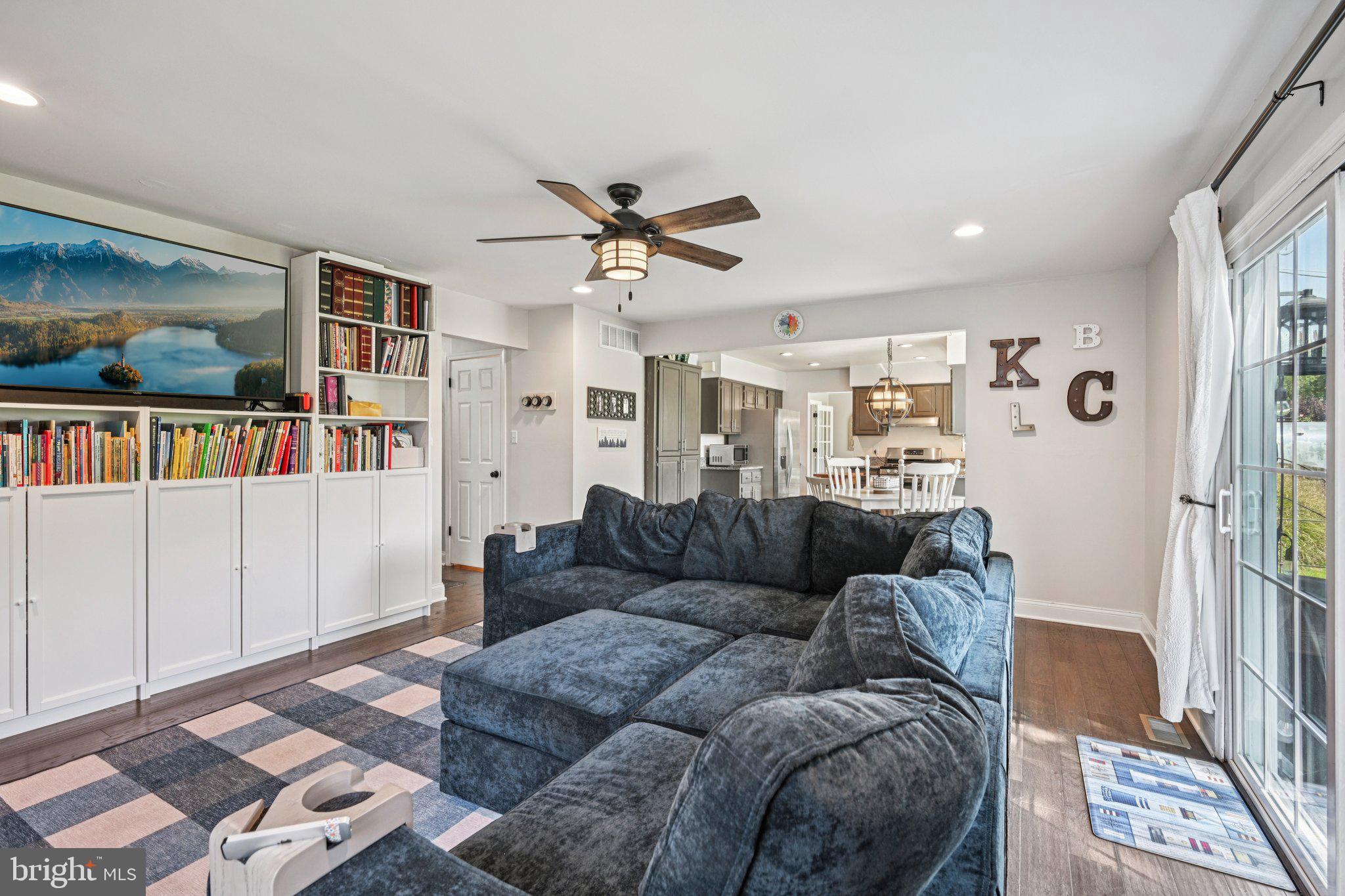 39 Willow Ridge Road Marlton, NJ 08053 - Photo 16 of 43 a living room with furniture and a book shelf
