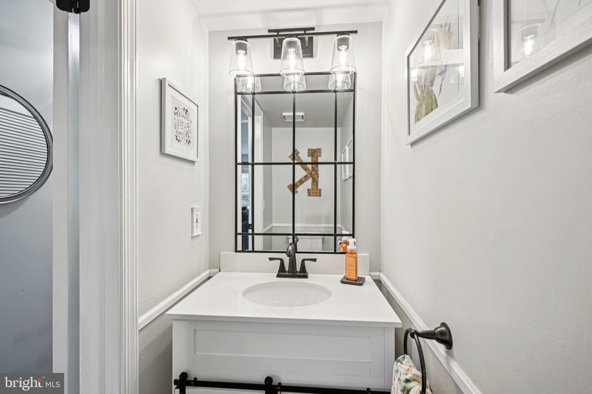 39 Willow Ridge Road Marlton, NJ 08053 - Photo 20 of 43 a bathroom with a sink and mirror