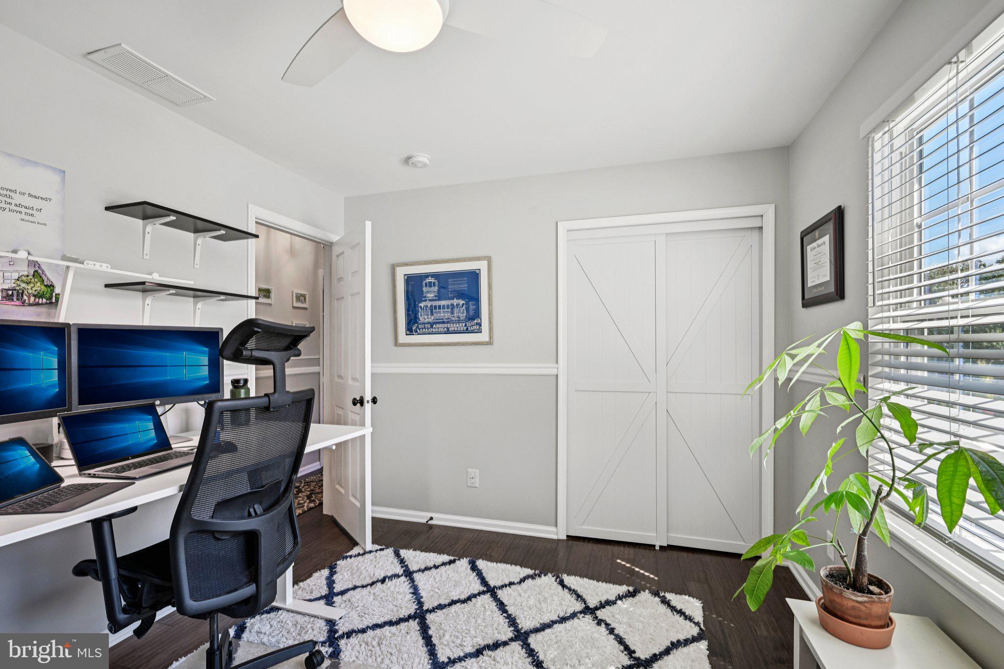 39 Willow Ridge Road Marlton, NJ 08053 - Photo 29 of 43 a workspace with furniture and potted plant