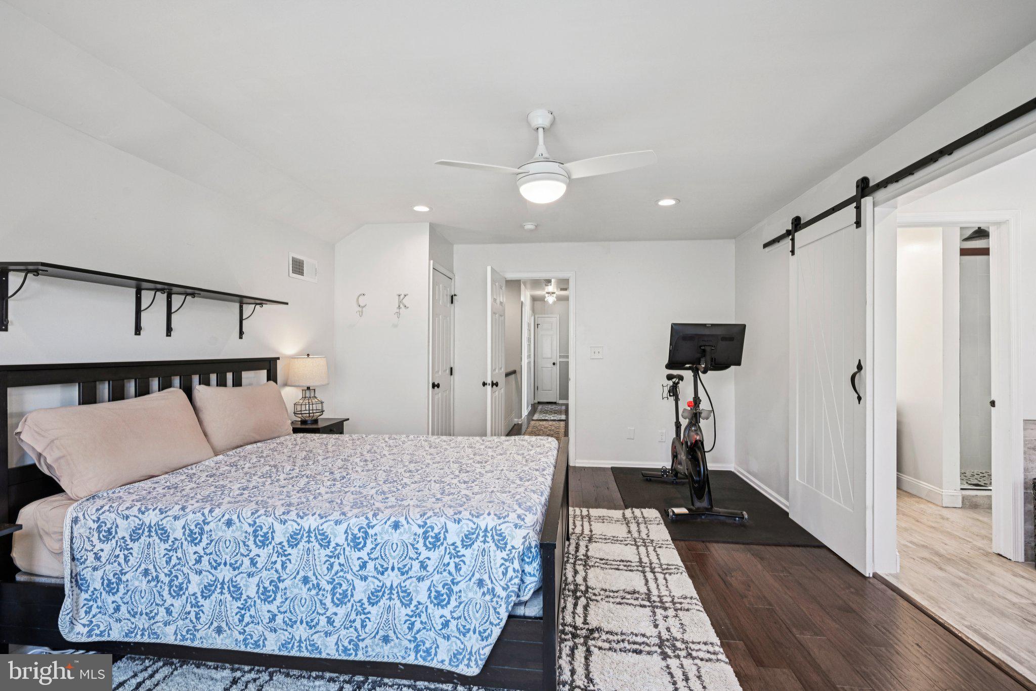 39 Willow Ridge Road Marlton, NJ 08053 - Photo 32 of 43 a bedroom with a large bed and a walk in closet