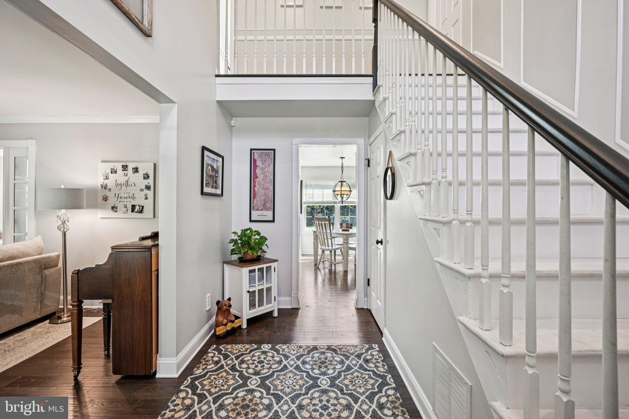 39 Willow Ridge Road Marlton, NJ 08053 - Photo 6 of 43 a view of entryway with wooden floor and a rug