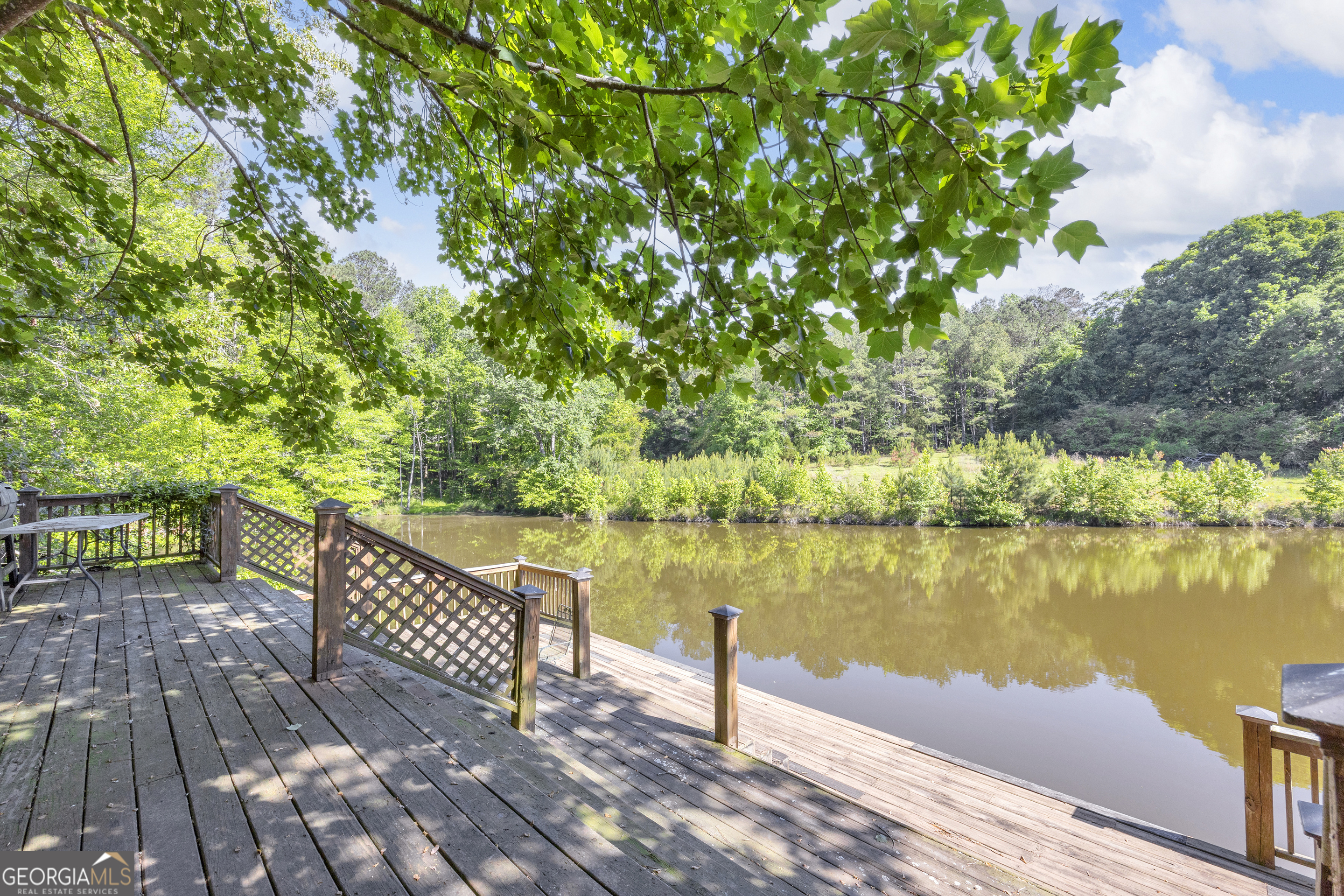 1641 Churchwell Rd Union Point Union Point, GA 30669 - Photo 11 of 48 a view of a wooden deck with lake view