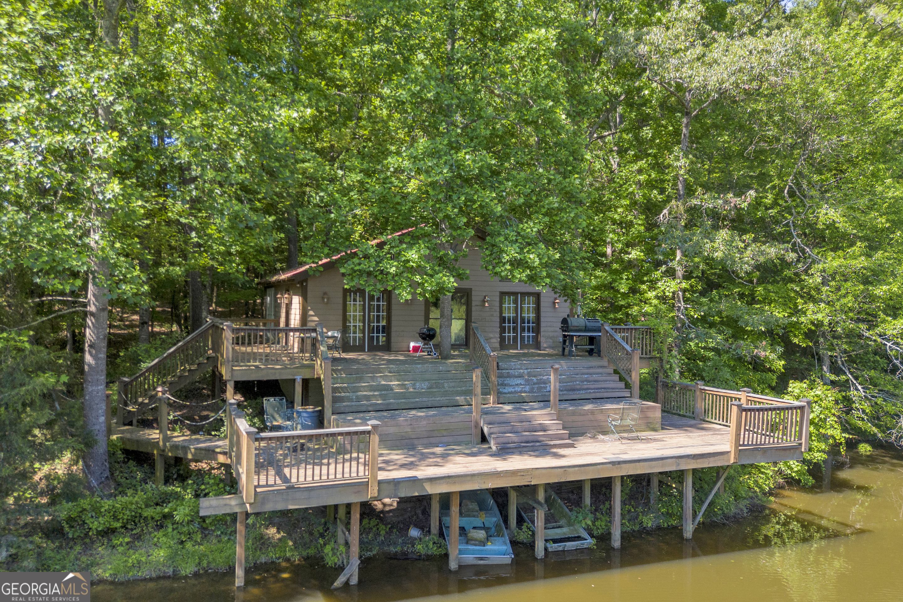 1641 Churchwell Rd Union Point Union Point, GA 30669 - Photo 2 of 48 a view of house with roof deck and seating space