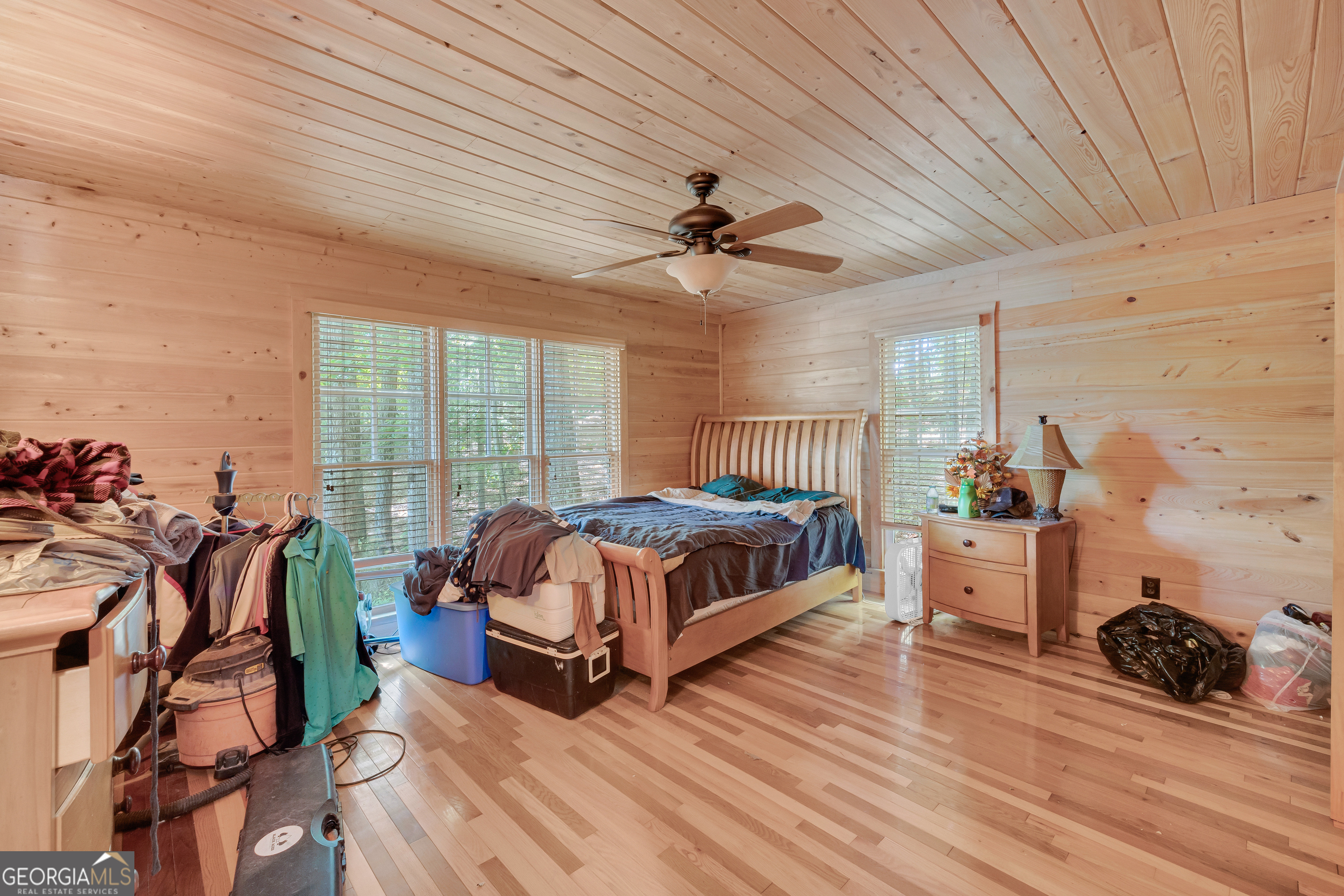 1641 Churchwell Rd Union Point Union Point, GA 30669 - Photo 24 of 48 a bedroom with furniture and a large window