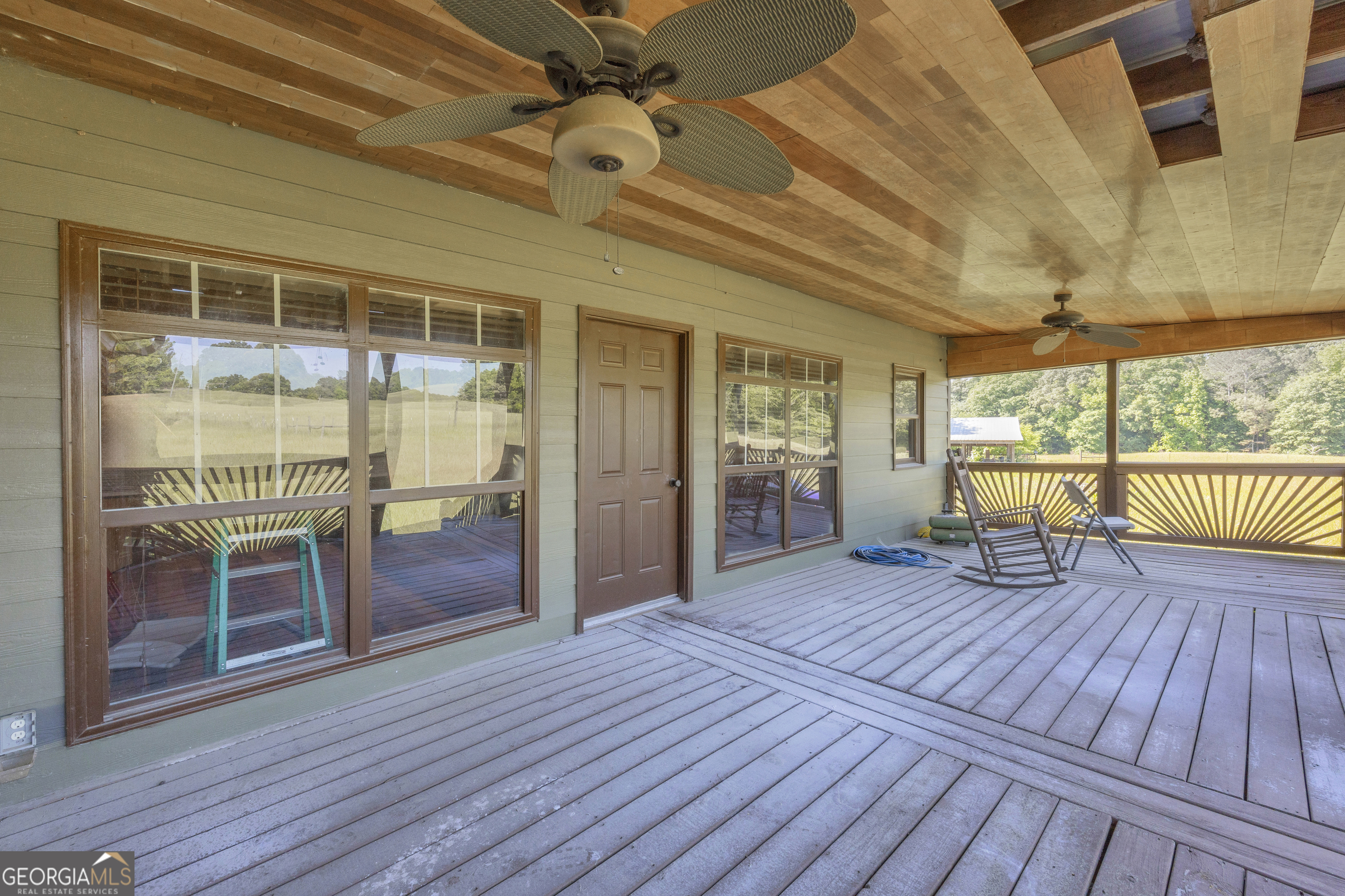 1641 Churchwell Rd Union Point Union Point, GA 30669 - Photo 30 of 48 a view of a room with wooden floor and furniture