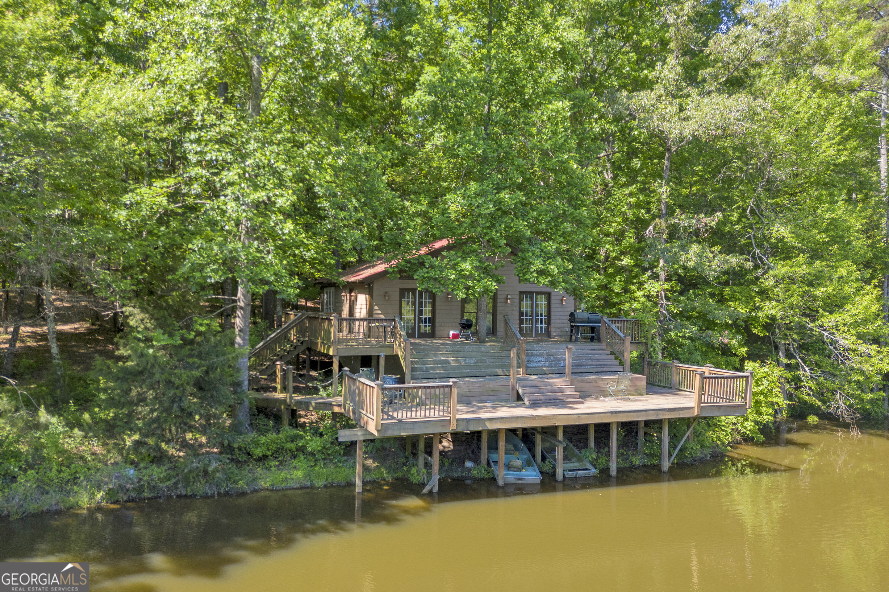 1641 Churchwell Rd Union Point Union Point, GA 30669 - Photo 3 of 48 a view of house with a lake view