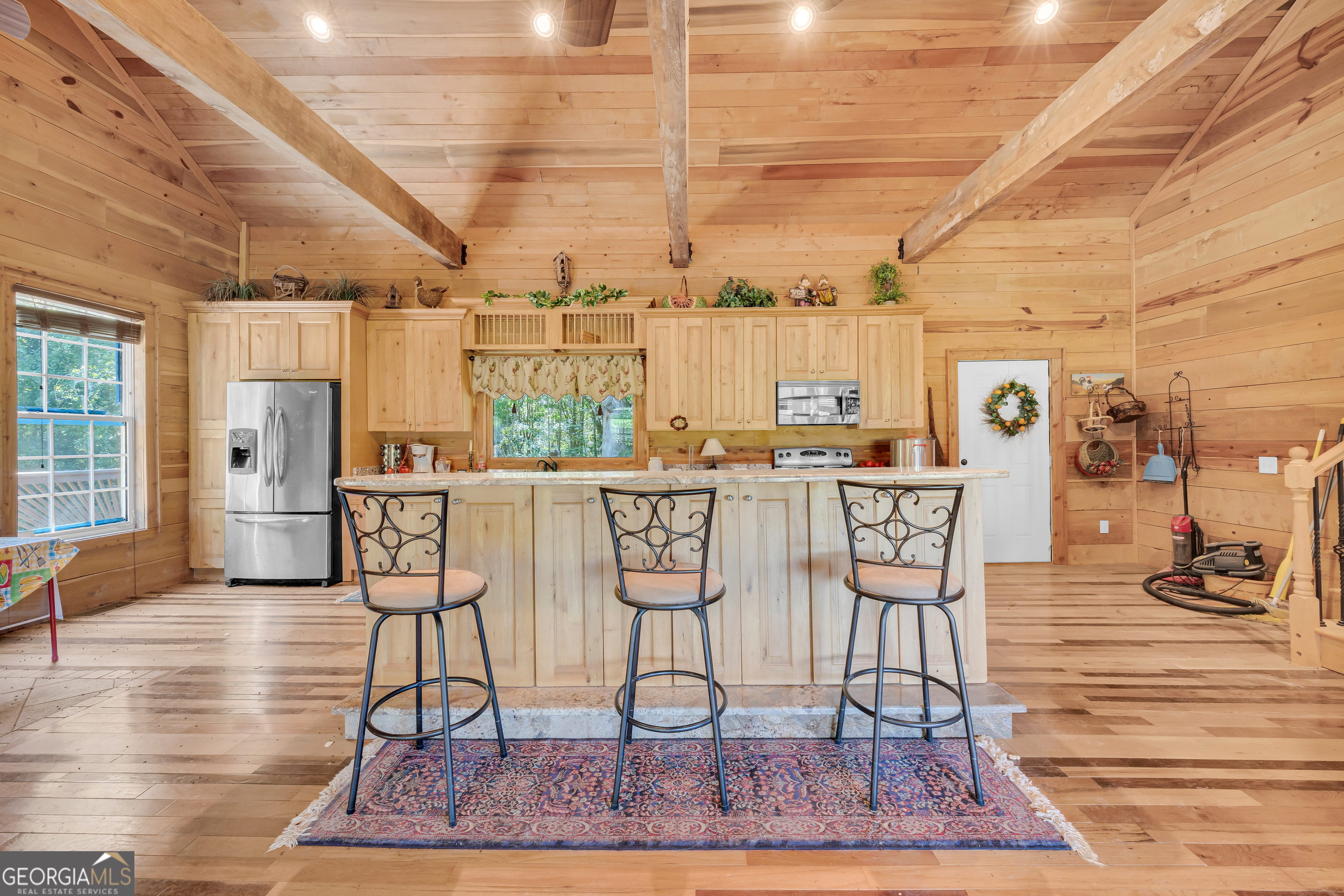 1641 Churchwell Rd Union Point Union Point, GA 30669 - Photo 42 of 48 a dining room with furniture and wooden floor