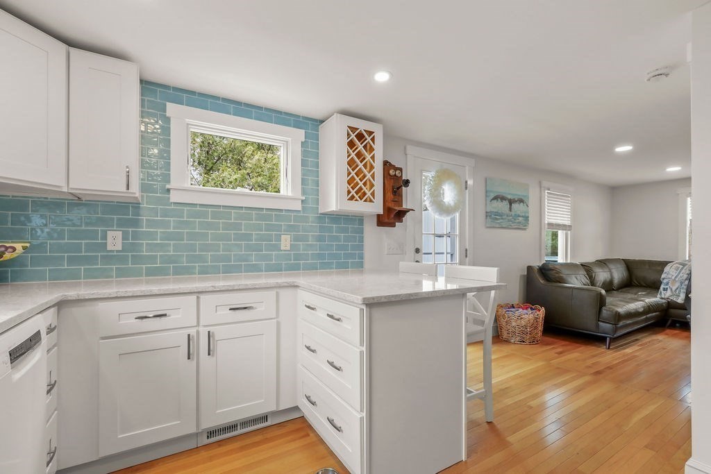 13 Monack Road Wareham, MA 02532 - Photo 11 of 28 a kitchen with cabinets a sink and appliances