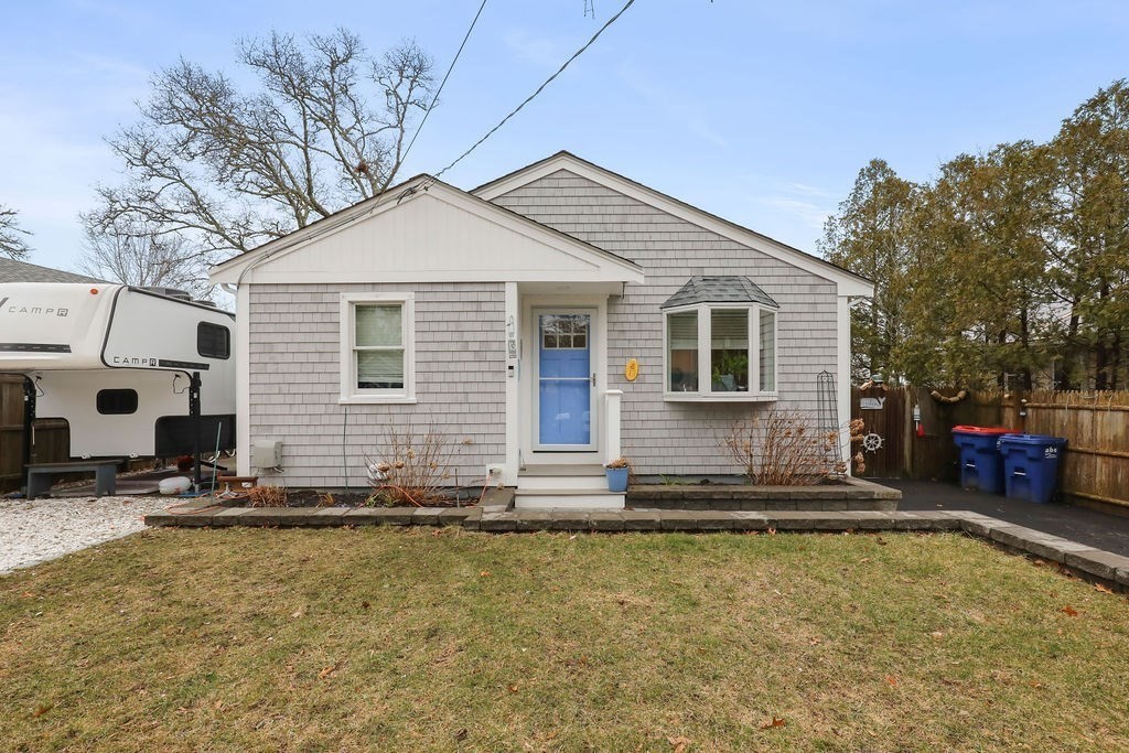 13 Monack Road Wareham, MA 02532 - Photo 2 of 28 a view of a house with snow on the wall