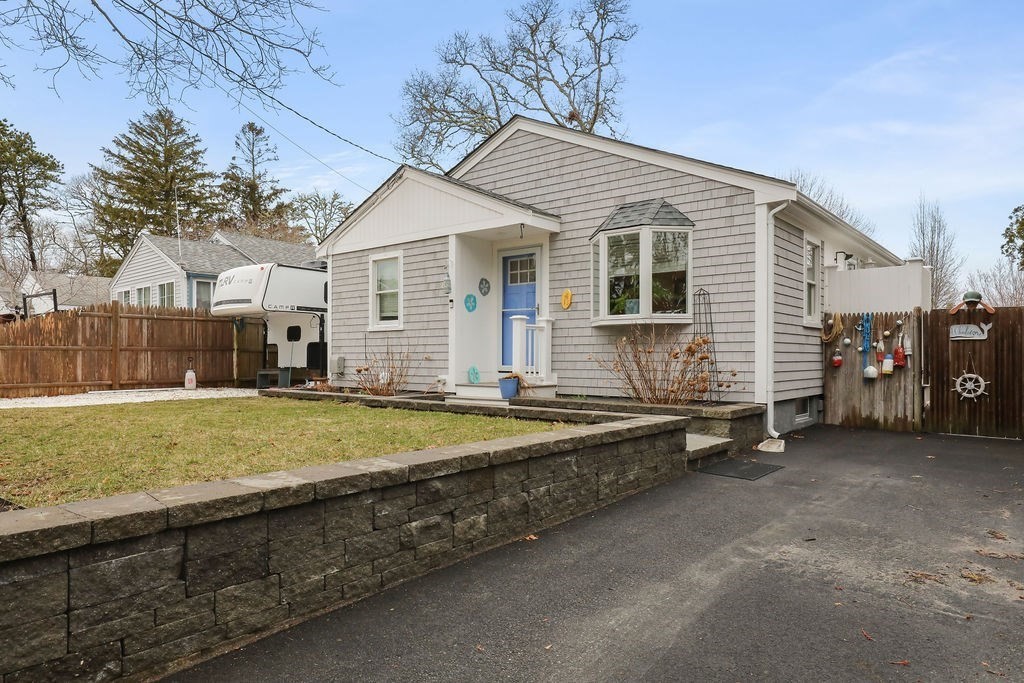 13 Monack Road Wareham, MA 02532 - Photo 3 of 28 a view of a house with a yard