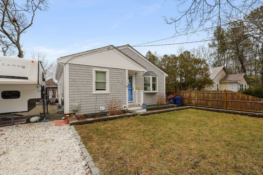 13 Monack Road Wareham, MA 02532 - Photo 4 of 28 a view of a house with a yard