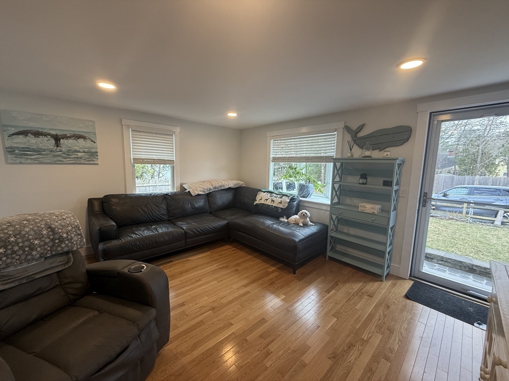 13 Monack Road Wareham, MA 02532 - Photo 6 of 28 a living room with furniture and a fireplace