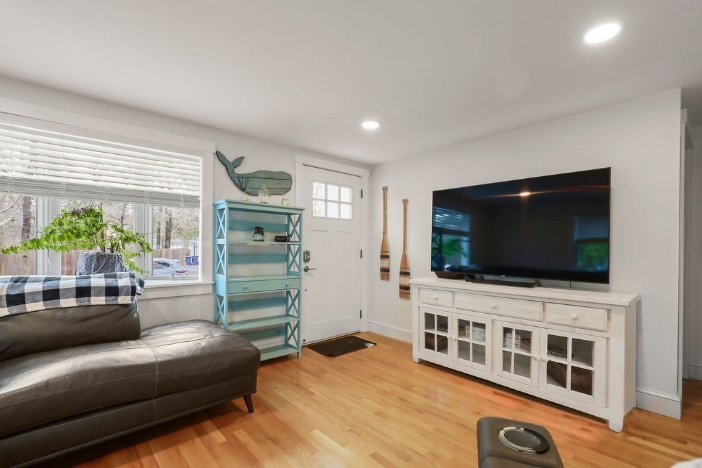 13 Monack Road Wareham, MA 02532 - Photo 7 of 28 a living room with furniture and a flat screen tv