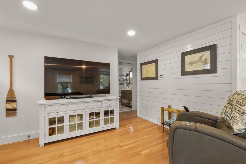 13 Monack Road Wareham, MA 02532 - Photo 9 of 28 a living room with furniture and a flat screen tv