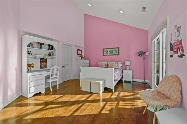 a bedroom with a bed and furniture